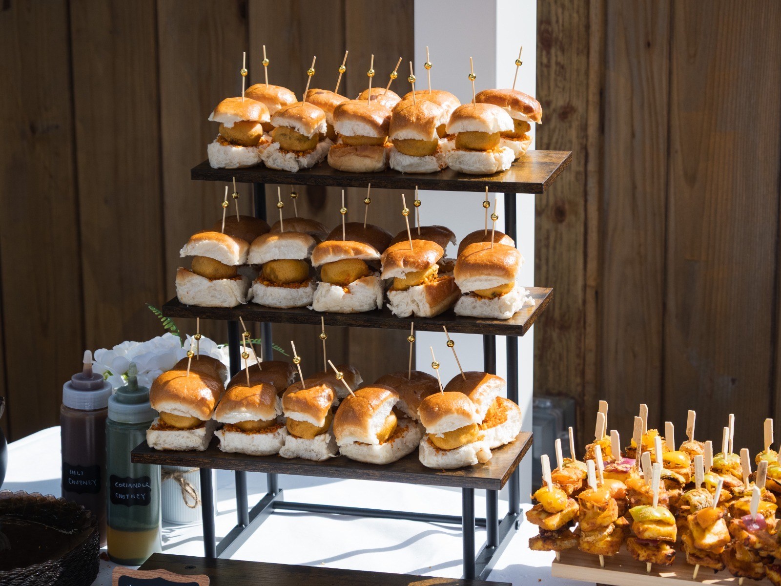 Vada pav on a tiered serving stand